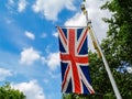Union Jack flag on United Kingdom hanging from pole along The Mall Royalty Free Stock Photo