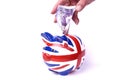 Union jack pippy bank with money Royalty Free Stock Photo