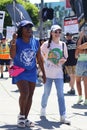 Union members walk the picket line in support of the SAG-AFTRA and WGA