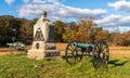 A Union monument and civil war cannons in the Wheatfield on the Gettysburg National Military Park Royalty Free Stock Photo