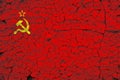 The Union of Soviet Socialist Republics USSR flag painted over cracked concrete wall