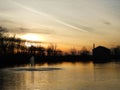 Fingerlakes pond reflection during winter sunset Royalty Free Stock Photo