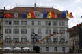 Union Square in Timisoara decorated festive with Romanian flags blown by wind