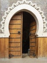 Unique arabic style doorway with wooden doors Royalty Free Stock Photo