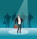 Unique businessman standing in searchlight. Stand out by employer, career and recruitment vector concept Royalty Free Stock Photo