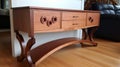 Unique Carved Wooden Console Table With Kinetic Lines And Curves