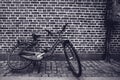 Unique classic vintage hipster bicycle leaning against the stree