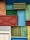 Colorful wooden doors and boxes of various sizes and shapes