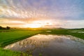 Unique countryside view in Vietnam beautiful Phu Yen province rice paddies ecosystem sunset reflection water colorful cloudscape, Royalty Free Stock Photo