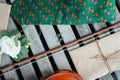 Unique cufflinks in the form of a violin key lie on a violin