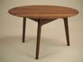 Unique design table with round top made of natural wood