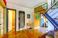 Unique entryway to home with very colorful interior.