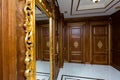 Unique exclusive wooden furniture doors mirror in hallway