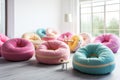 A unique and eye-catching way to decorate your home, these donut-shaped cushions are sure to make a statement