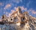 Unique geological formations with birdhouses and dovecotes in Red valley, Cappadocia, Central Anatolia, Turkey Royalty Free Stock Photo