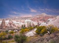 Unique geological formations in Red valley in autumn at sunset in Cappadocia, Central Anatolia, Turkey Royalty Free Stock Photo