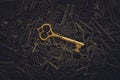 Unique gold key on pile of vintage skeleton keys. Concept for individual or uniqueness, unlocking potential, or stand out from the