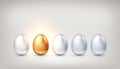 Unique golden egg among ordinary white eggs, the concept of exclusivity, success. Bright individuality, successful personality