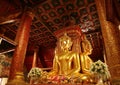 Unique and Gorgeous Golden Four-sided Seated Buddha Images of Wat Phumin Temple, Famous Buddhist Temple in Nan Province, Thailand