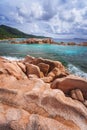 Unique granite rocks, blue ocean lagoon of remote L anse beach during day hike around La Digue island, Seycheles islands