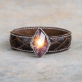 Unique leather bracelet with glowing gemstone Royalty Free Stock Photo
