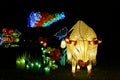 Fountain with an unique light decoration of a highland cow.