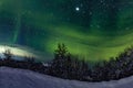 A unique natural event of the green polar aurora borealis in the sky Royalty Free Stock Photo