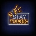 Neon Sign stay tuned with Brick Wall Background vector Royalty Free Stock Photo