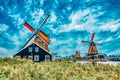 Unique old, authentic, real working windmills in the suburbs of Amsterdam, the Netherlands Royalty Free Stock Photo