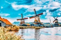 Unique old, authentic, real working windmills in the suburbs of Amsterdam, the Netherlands Royalty Free Stock Photo