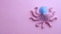 Unique Origami Octopus Crafted From Folded Paper Against a Pastel Background With Ample Space for Creative Text Royalty Free Stock Photo