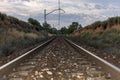 Unique railroad line at the sunset. Train railway track . Low clouds over the railroad