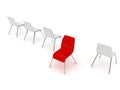 Unique red chair in row of white others Royalty Free Stock Photo