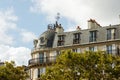 Unique roof line for apartment building in Paris, France