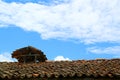 Unique Rustic Tiled Roof Against Blue Sky in Chachapoyas, Amazonas Region, Peru, South America