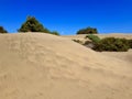 Unique Sand Dune with Natural Sand Structures beneath a Deep Blue Sky on Gran Canaria Island Royalty Free Stock Photo