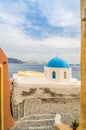 Unique Santorini architecture, church with blue cupola Royalty Free Stock Photo