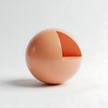 A unique sculpture featuring a peach-colored sphere with a quarter section removed Royalty Free Stock Photo