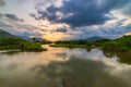 Unique sunset sky in Vietnam beautiful Phu Yen province Cam Lap promontory forest hill river ecosystem water reflection colorful Royalty Free Stock Photo