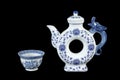 Unique teapot and teacup Royalty Free Stock Photo