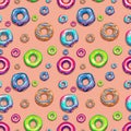 Unique vector seamless pattern with colorful donuts with glaze and sprinkles. Isolated on a separate pink background.