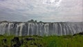 Unique Victoria Falls. The Zambezi River brings down numerous powerful streams of water