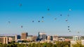 Unique view of the Boise skyline in summer with many hot air balloons floating by Royalty Free Stock Photo