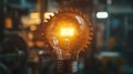 Unique Vintage Light Bulb with Gear in a Dimly Lit Industrial Environment Royalty Free Stock Photo