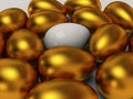 Unique white egg among gold eggs Royalty Free Stock Photo