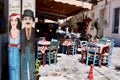 Uniquely decorated and furnished restaurant outdoor seating in blue, red and white Royalty Free Stock Photo