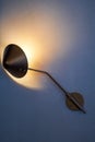 A uniquely designed incandescent art spotlight on the wall Royalty Free Stock Photo