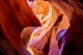 Uniquely shaped natural landscape at Lower Antelope Canyon in Page Arizona with vibrant sandstones stacked in flaky fire waves in