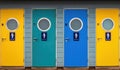 Unisex colourful public toilet doors on the seafront at Weymouth
