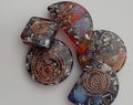 unisex orgonite pendants of various shapes and colors